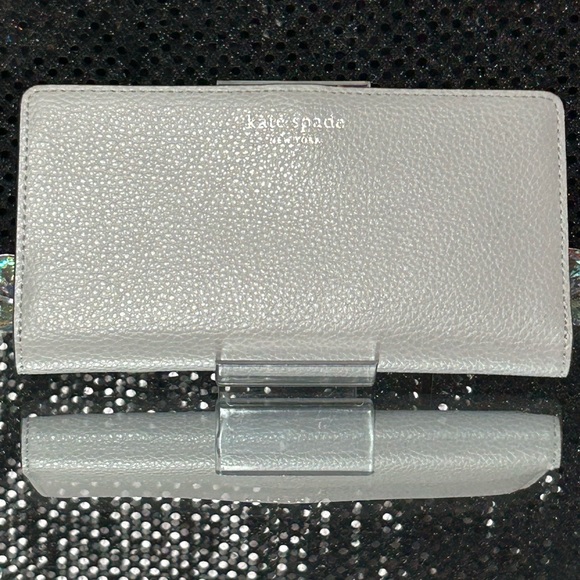 kate spade Handbags - Kate Spade New York Gray Leather Wallet Approx. 7 x 3.5
